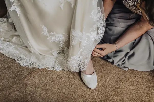 ivory dress with silver shoes